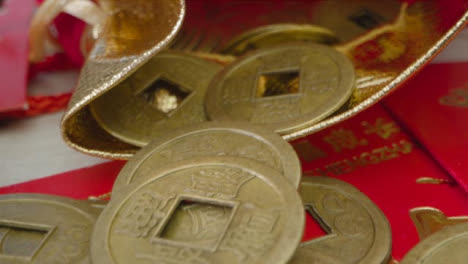 Sliding-Macro-Shot-of-Over-Pile-of-Chinese-New-Year-Red-Envelopes